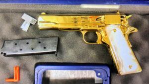 Gold pistol detected by Australia Border Protection carried by a woman on her way to clown school.